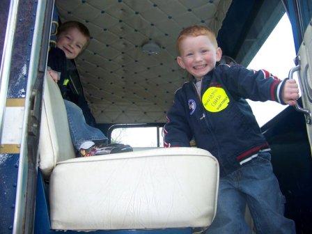 Aidan and brother Bryce in truck