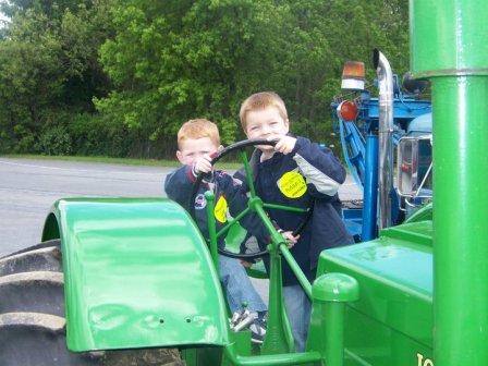 Bryce and A on tractor